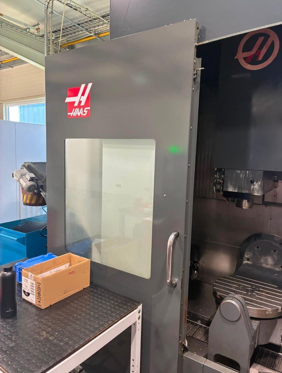 5-осевой универсальный обрабатывающий центр с ЧПУ HAAS UMC-750 2014 года-ID18028