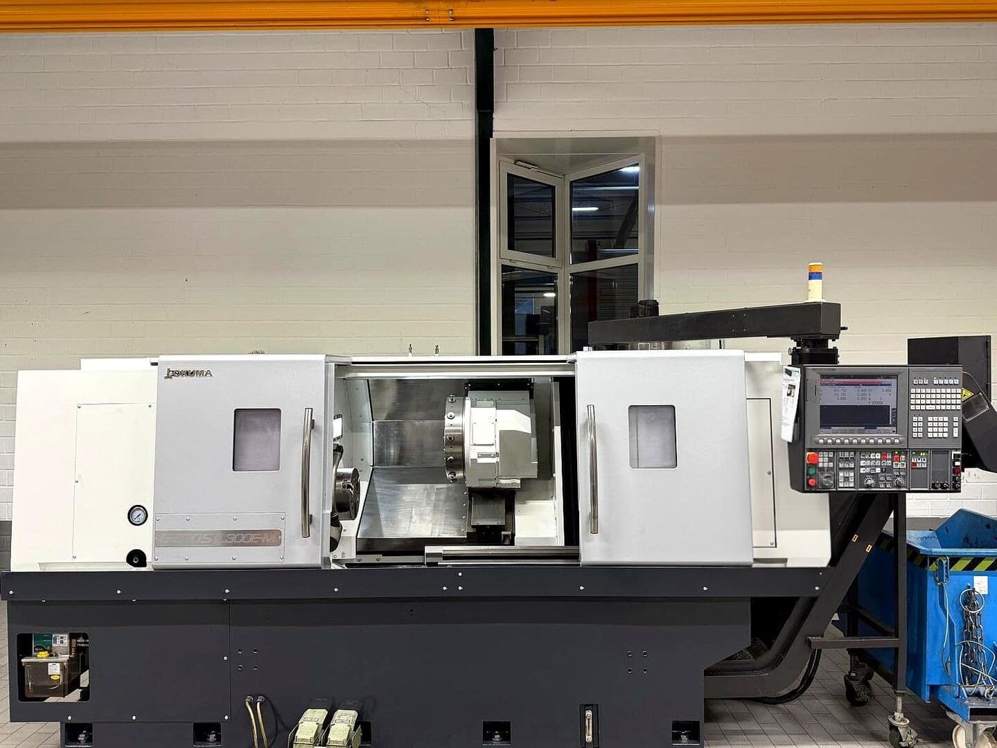 Горизонтальный токарный станок с ЧПУ с наклонной станиной Okuma Genos L 300 E-M-ID17502