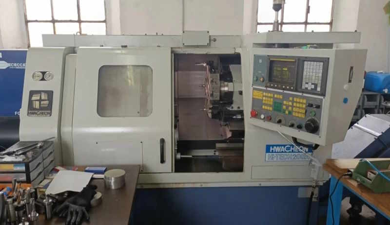 Токарный станок с ЧПУ б/у с фиксированными инструментами Hwacheon HI TECH 200 A-ID17144