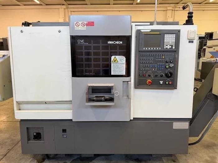 Токарный станок с ЧПУ Hwacheon CUTEX 160 б/у с устройством подачи прутка-ID17151
