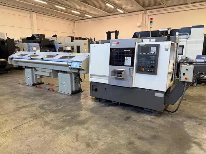 Токарный станок с ЧПУ Hwacheon CUTEX 160 б/у с устройством подачи прутка-ID17151