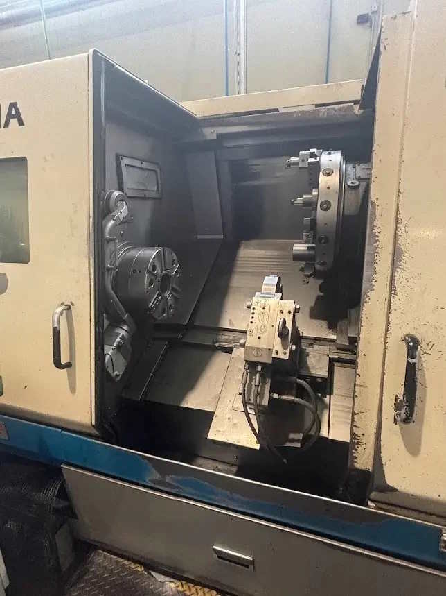 Токарный станок с ЧПУ OKUMA LB 400 с фиксированным инструментом.-ID17933