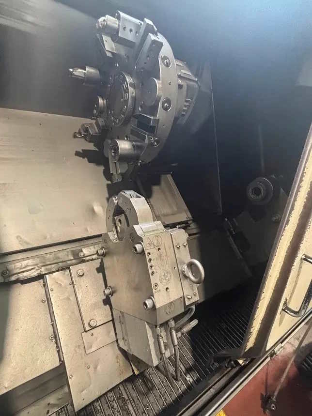 Токарный станок с ЧПУ OKUMA LB 400 с фиксированным инструментом.-ID17933
