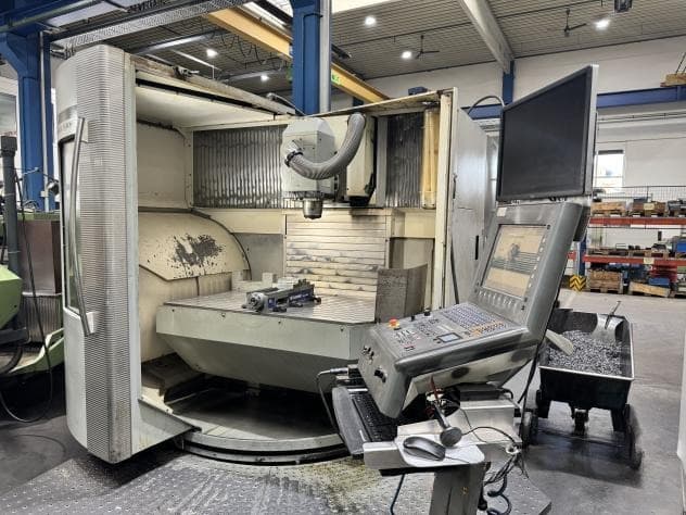 Универсальный фрезерный обрабатывающий центр с ЧПУ DMG DMU 100 T-ID17453