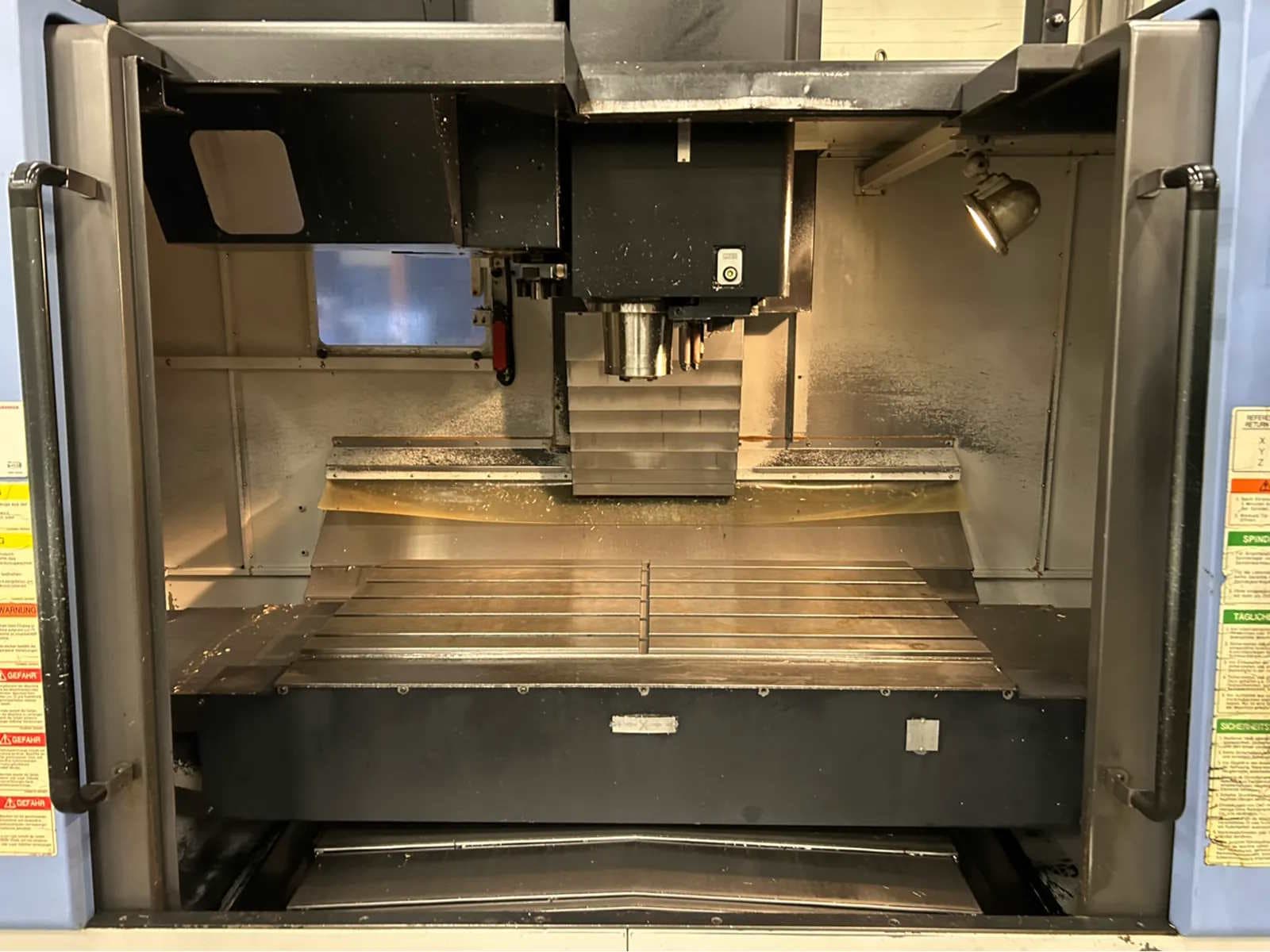 Универсальный обрабатывающий центр с ЧПУ Doosan Mynx 650 (4-я ось)-ID17605