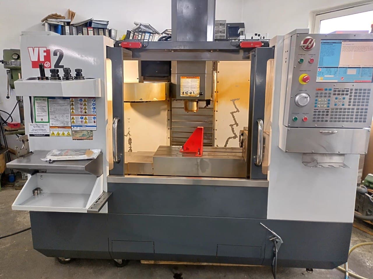 Вертикальный фрезерный обрабатывающий центр с ЧПУ + 4-я ось HAAS VF-2 + HRT-160-ID18018